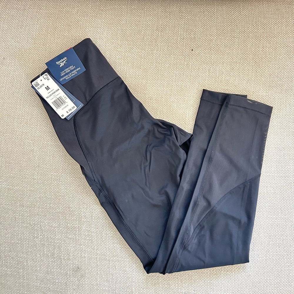 Reebok 2 lux perform high-rise tights. NWT, black. Size M